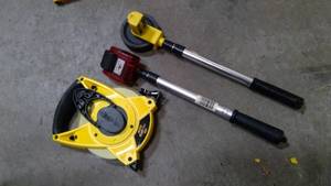 lot 553 image: Measuring wheels Stanley open wheel tape measure