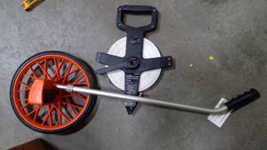 lot 554 image: Measuring wheel open wheel tape measure