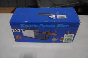 lot 115 image: Electric Potato Slicer
