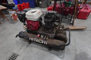 lot 18 image: Hitachi 8 Gallon Gas Air Compressor