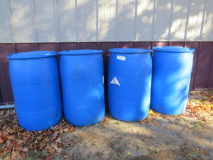 lot 18 image: Mixed Lot of 4 50 Gallon Drums