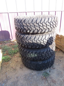 lot 2 image: Set of Four Chevrolet Silverado Rims with Tires