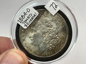 lot 72 image: 1884-O Morgan Silver Dollar