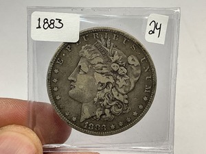 lot 24 image: 1883 Morgan Silver Dollar