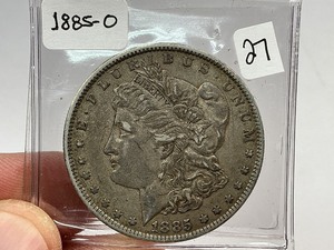 lot 27 image: 1885-O Morgan Silver Dollar