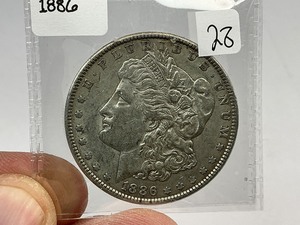 lot 28 image: 1886 Morgan Silver Dollar