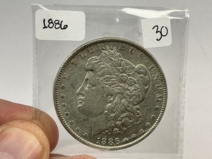 lot 30 image: 1886 Morgan Silver Dollar