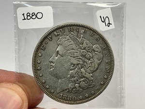 lot 42 image: 1880 Morgan Silver Dollar