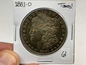 lot 61 image: 1881-O Morgan Silver Dollar