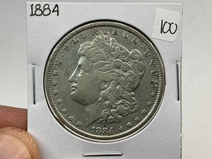 lot 100 image: 1884 Morgan Silver Dollar