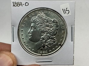 lot 115 image: 1884-O Morgan Silver Dollar