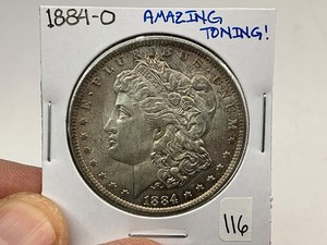 lot 116 image: 1884-O Morgan Silver Dollar