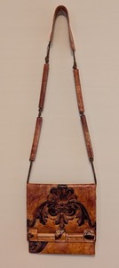 lot 179 image: UL - Susan Riedweg Tooled Leather Purse with Wood Accents