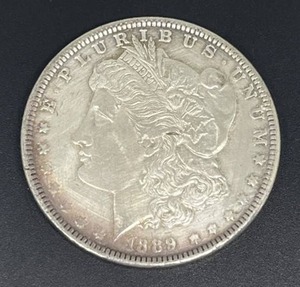 lot 9 image: 1889 Morgan Silver Dollar