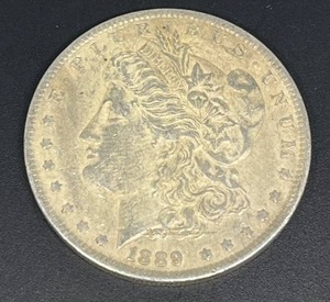 lot 12 image: 1889 Morgan Silver Dollar