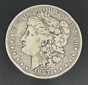 lot 33 image: 1887-O Morgan Silver Dollar