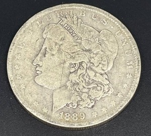 lot 38 image: 1889-O Morgan Silver Dollar