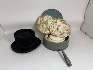 lot 39 image: Mad Hatter Top Hat & Hair Dryer