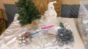 lot 7 image: Christmas Decor Lot with Tree, Santa Figurine, and Ornaments