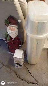 lot 24 image: Holiday Decor Lot Wooden Santa, Gift Wrap Storage Bin, Ribbon Holder Set