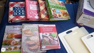 lot 41 image: Rival 17 Quart Roaster Oven, Assorted Cutting Boards, and 8 Cookbook Collection