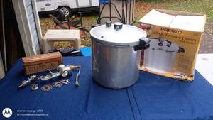 lot 44 image: Presto 23-Quart Pressure Canner with Universal Food & Meat Chopper
