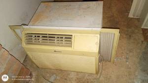 lot 66 image: Amana Window Air Conditioner Unit with Adjustable Side Panels