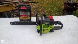 lot 104 image: Poulan Chainsaw with FVP Bar and Chain Oil