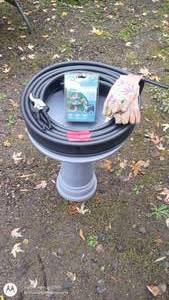 lot 111 image: Garden Bird Bath with Fountain Pump, Hose, Pruners, and Gloves