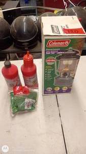 lot 120 image: Coleman Dual Fuel Lantern with Box, Fuel Bottles, and Filter Funnel