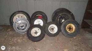 lot 156 image: Set of 7 Assorted Used Vehicle Wheels and Tires