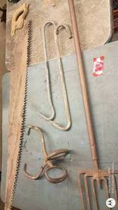 lot 165 image: Vintage Butcher Tools Set with Meat Saw, Hooks, and Ice Tongs