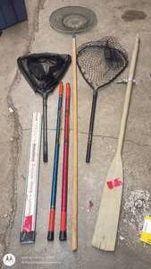lot 175 image: Fishing and Boating Accessory Lot with Nets, Poles, and Oar