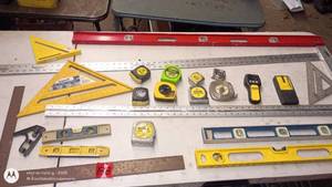 lot 188 image: Assorted Measuring and Layout Tools including Tape Measures, Levels, and Squares