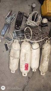 lot 195 image: Marine Accessory Lot with 4 Boat Fenders, Winches, Ropes, and Hardware