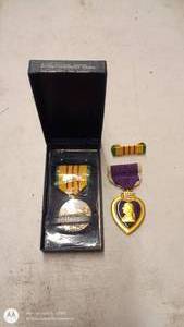 lot 214 image: Vietnam Service Medal and Purple Heart Medal with Ribbons and Case