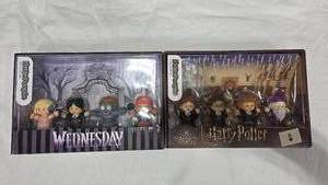 lot 229 image: Wednesday and Harry Potter Little People Action Figures