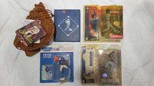 lot 255 image: Lot of baseball Figurines, Catchers Mitt, and Trading Cards