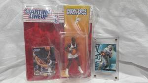 lot 256 image: LePhonso Ellis Figurine and Barry Sanders Trading Card