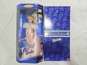 lot 262 image: Enchanted Evening Barbie and Avon Winter Barbie