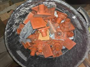 lot 140 image: Trashcan of stake caps