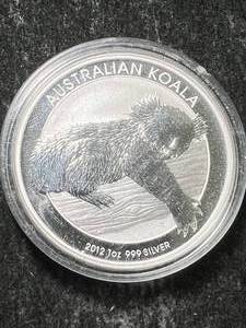 lot 09 image: 2012 AUSTRALIAN KOALA 1 TROY OZ .999 FINE SILVER IN AIRTITE