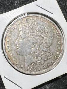 lot 14 image: 1899-O US MORGAN SILVER DOLLAR