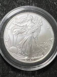 lot 37 image: 2024 AMERICAN SILVER EAGLE 1 TROY OZ .999 FINE SILVER IN AIRTITE