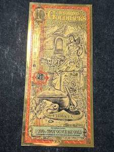 lot 81 image: 1100TH TROY OZ 24K GOLD $10 WYOMING GOLDBACK