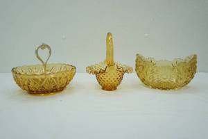 lot 77 image: Vintage Amber Glass Pieces