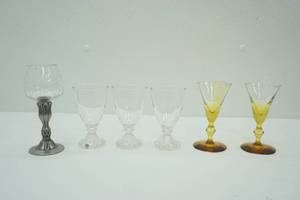 lot 107 image: (3ct) Anchor Hocking Clear Berwick-Boopie JuiceWine Glasses, Crystal Brandy Glass wPewter Base, & (2ct) Libbey Forever Amber Sherry Glass