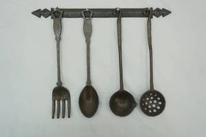 lot 129 image: Cast Iron Decorative Utensils and Wall Hang