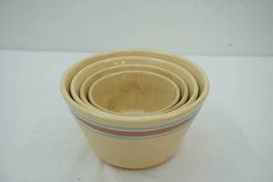 lot 294 image: Vintage Watt Pottery Yellow Ware Nesting Bowls (4ct)