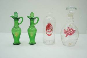 lot 376 image: Vintage Avon Green Nile Bottles Bohemian Crystal Decanters